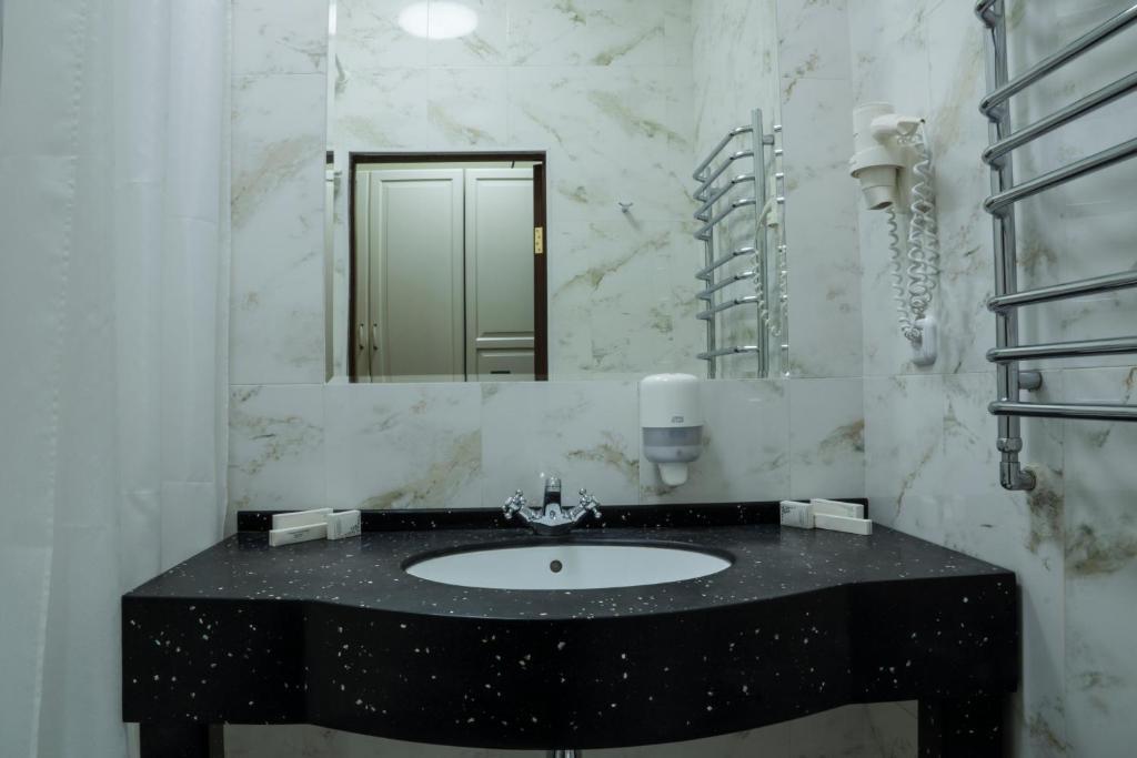 Ar Nuvo Hotel Karagandi Szoba fotó
